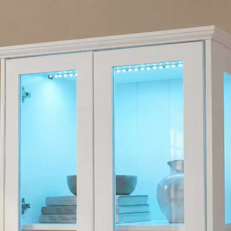 Bibliothèque-vitrine blanche avec éclairage LED RGB, tiroirs et portes vitrées